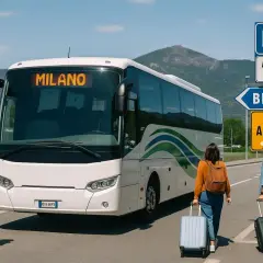 Autobus do Mediolanu czeka na pasażerów. Znak wskazuje drogę do Bergamo i lotniska Orio al Serio.