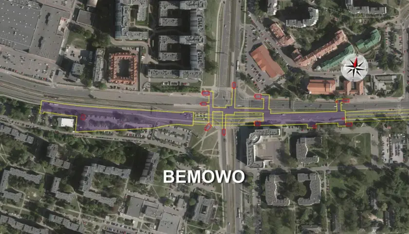 Widok z lotu ptaka na Bemowo z zaznaczonym obszarem metra, skrzyżowaniami i budynkami.